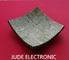 Material compuesto piezoeléctrico curvo